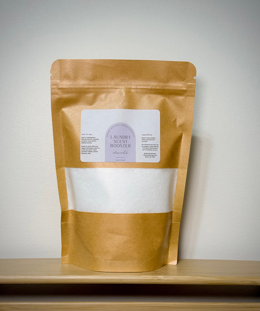 Kraft paper packaging with a white label on a wooden surface and light gray background